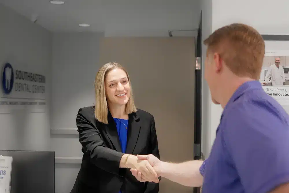 Reception handshake with patient