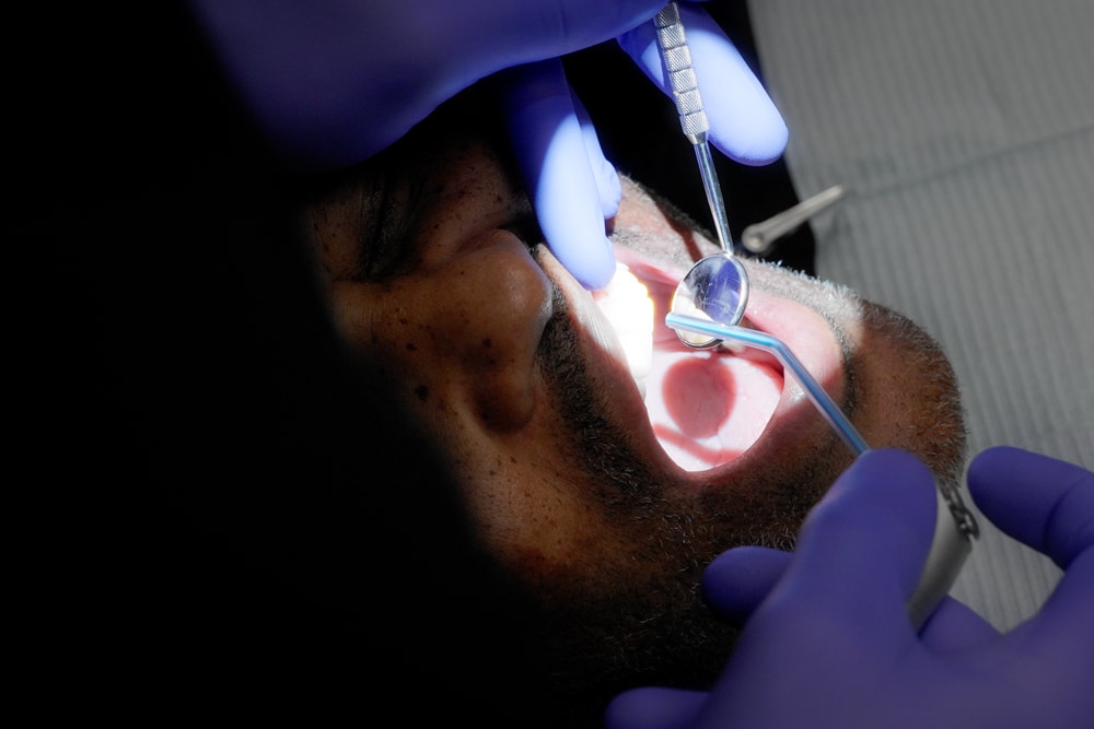 A happy patient looking at the dentist
